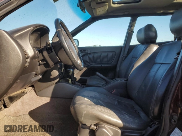 1999 Subaru Legacy Outback z VIN 4S3BG6853X7603582, wystawiony jako Copart lot #42632735 z przebiegiem 183 424 mil mil oraz Szkoda całkowita • Salvage title. Historia ofert i sprzedaży dostępna na DreamBid. Obrazek 7.