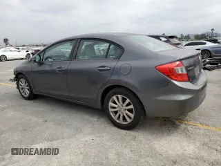 2012 Honda Civic EX with VIN 2HGFB2F86CH330174, listed as a Copart auction lot 56070795 with 137,040 mi miles and Salvage Title. Bid and sale history available at DreamBid. Image 2.