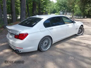 2013 BMW 7 Series 750Li with VIN WBAYE8C55DDS16013, listed as a IAAI auction lot 42709519 with 123,405 mi miles and . Bid and sale history available at DreamBid. Image 4.