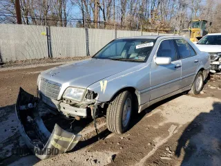 1999 Mercedes-Benz C 230/260/280/320 with VIN WDBHA24GXXA801766, listed as a Copart auction lot 42982255 with 146,774 mi miles and Salvage Title. Bid and sale history available at carsss.com. Image 1.