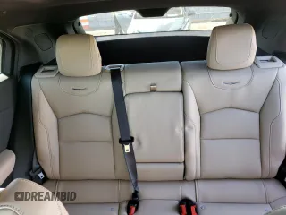 2024 Cadillac XT4 AWD Luxury with VIN 1GYFZBR41RF114434, listed as a Copart auction lot 73217514 with 10,505 mi miles and Salvage Title. Bid and sale history available at carsss.com. Image 10.