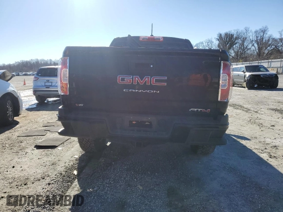2021 GMC Canyon 4WD AT4 w/Leather with VIN 1GTG6FEN4M1155641, listed as a Copart auction lot 86793644 with 36,940 mi miles and Salvage Title. Bid and sale history available at carsss.com. Image 6.