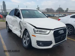 2015 Audi Q3 Premium Plus z VIN WA1BFCFS9FR006640, wystawiony jako IAAI lot #41276297 z przebiegiem 133 646 mil mil oraz . Historia ofert i sprzedaży dostępna na DreamBid. Obrazek 1.