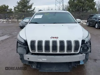 2016 Jeep Cherokee Latitude with VIN 1C4PJMCB7GW268714, listed as a IAAI auction lot 41655450 with 180,603 mi miles. Bid and sale history available at carsss.com. Image 13.