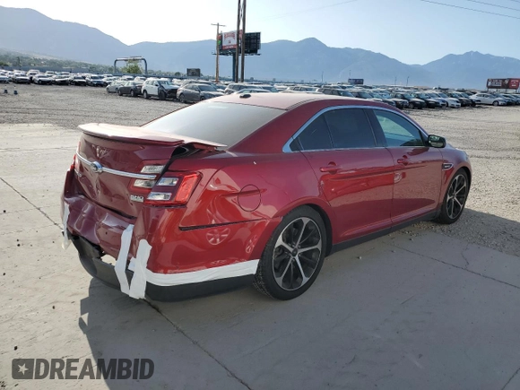 2014 Ford Taurus SHO with VIN 1FAHP2KT9EG115170, listed as a Copart auction lot 61203645 with 106,740 mi miles and Salvage title. Bid and sale history available at DreamBid. Image 3.
