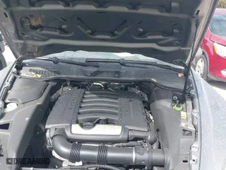 2014 Porsche Cayenne with VIN WP1AA2A26ELA06533, listed as a IAAI auction lot 41693450 with 91,463 mi miles. Bid and sale history available at carsss.com. Image 10.
