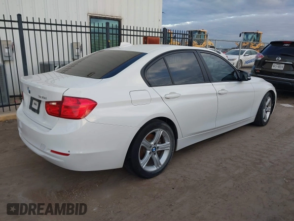 2015 BMW 3 Series 320i with VIN WBA3B1G50FNT04520, listed as a IAAI auction lot 41343158 with 172,688 mi miles. Bid and sale history available at carsss.com. Image 4.