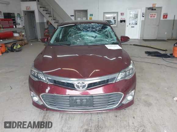 2013 Toyota Avalon XLE with VIN 4T1BK1EB8DU033454, listed as a IAAI auction lot 42001162 with 66,783 mi miles and . Bid and sale history available at DreamBid. Image 12.