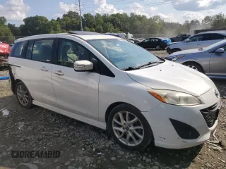 2014 Mazda 5 Touring with VIN JM1CW2CL5E0165062, listed as a Copart auction lot 72452994 with 177,939 mi miles and Salvage Title. Bid and sale history available at DreamBid. Image 4.