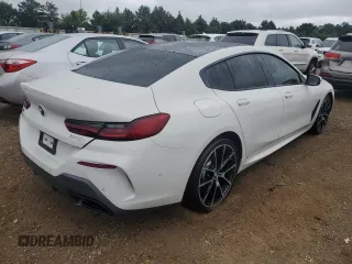 2021 BMW 8 Series 840i with VIN WBAGV4C08MCF11592, listed as a Copart auction lot 65170264 with 63,929 mi miles and Salvage Title. Bid and sale history available at carsss.com. Image 3.