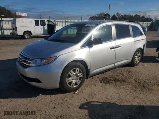 2011 Honda Odyssey LX with VIN 5FNRL5H26BB010599, listed as a Copart auction lot 85922514 with 148,401 mi miles and Salvage Title. Bid and sale history available at carsss.com. Image 1.
