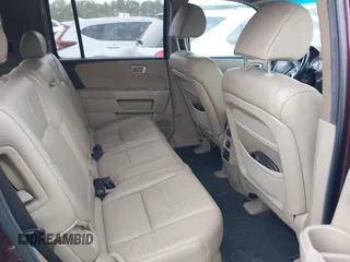 2011 Honda Pilot EX-L with VIN 5FNYF3H61BB050776, listed as a IAAI auction lot 41934621 with 172,424 mi miles and . Bid and sale history available at DreamBid. Image 8.