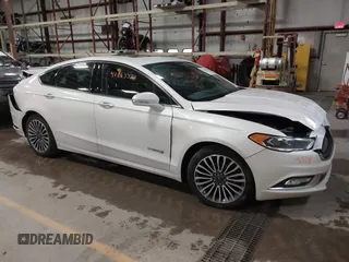 2018 Ford Fusion Titanium with VIN 3FA6P0RU1JR185937, listed as a IAAI auction lot 41863378 with 133,641 mi miles and . Bid and sale history available at DreamBid. Image 1.