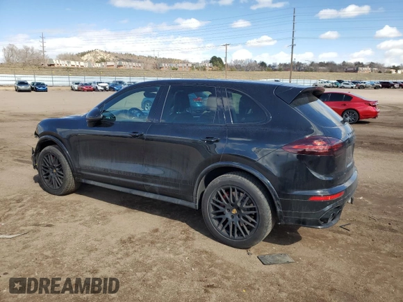 2016 Porsche Cayenne GTS z VIN WP1AD2A21GLA72479, wystawiony jako Copart lot #47125165 z przebiegiem 74 942 mil mil oraz Szkody całkowita. Historia ofert i sprzedaży dostępna na DreamBid. Obrazek 2.