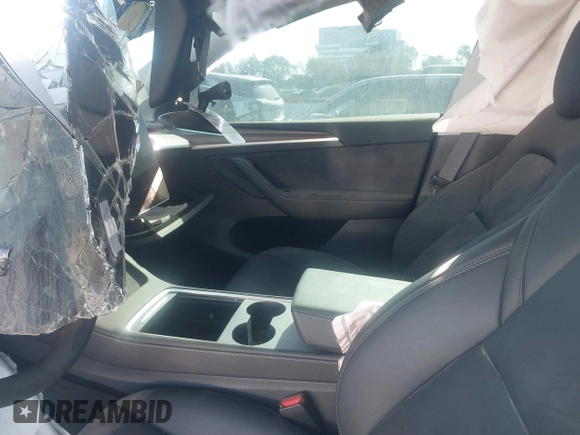 2024 Tesla Model Y Performance with VIN 7SAYGDEF7RF021464, listed as a IAAI auction lot 41225432 with Not Provided miles and . Bid and sale history available at DreamBid. Image 5.