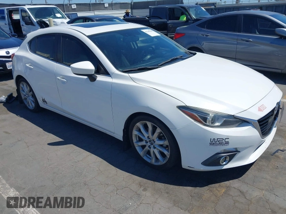2015 Mazda 3 S Grand Touring with VIN JM1BM1M39F1233093, listed as a IAAI auction lot 42245609 with 137,487 mi miles and . Bid and sale history available at DreamBid. Image 1.