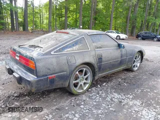 1989 Nissan 300ZX z VIN JN1HZ14S7KX290051, wystawiony jako IAAI lot #42203078 z przebiegiem 136 643 mil mil oraz . Historia ofert i sprzedaży dostępna na DreamBid. Obrazek 4.