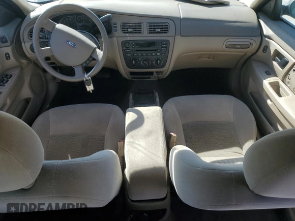 2006 Ford Taurus SE with VIN 1FAFP53U96A226497, listed as a Copart auction lot 82565654 with Not Provided miles and Salvage Title. Bid and sale history available at DreamBid. Image 8.
