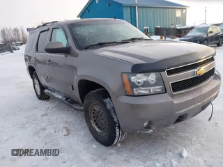 2013 Chevrolet Tahoe LT with VIN 1GNSKBE0XDR296094, listed as a IAAI auction lot 41448160 with 167,165 mi miles and . Bid and sale history available at DreamBid. Image 1.
