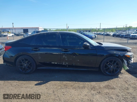 2022 Honda Civic Sport z VIN 2HGFE2F56NH606823, wystawiony jako IAAI lot #42140890 z przebiegiem 43 465 mil mil oraz . Historia ofert i sprzedaży dostępna na DreamBid. Obrazek 13.