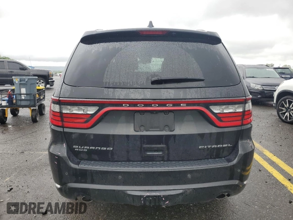 2016 Dodge Durango Citadel with VIN 1C4RDJEG7GC346904, listed as a Copart auction lot 58719145 with 166,786 mi miles and Salvage title. Bid and sale history available at DreamBid. Image 6.