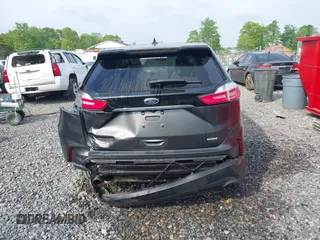 2020 Ford Edge SE z VIN 2FMPK3G97LBA25233, wystawiony jako IAAI lot #42240381 z przebiegiem 53 868 mil mil oraz . Historia ofert i sprzedaży dostępna na DreamBid. Obrazek 17.