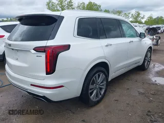 2021 Cadillac XT6 Premium Luxury z VIN 1GYKPDRS0MZ141453, wystawiony jako IAAI lot #42215954 z przebiegiem 144 245 mil mil oraz . Historia ofert i sprzedaży dostępna na DreamBid. Obrazek 4.