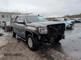 2017 GMC Sierra 1500 SLE z VIN 1GTV2MEC5HZ177175, wystawiony jako Copart lot #53640195 z przebiegiem 100 252 mil mil oraz Szkoda całkowita • Salvage title. Historia ofert i sprzedaży dostępna na DreamBid. Obrazek 14.