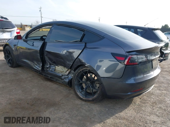 2019 Tesla Model 3 Long Range with VIN 5YJ3E1EB6KF413320, listed as a IAAI auction lot 41760428 with 90,441 mi miles and . Bid and sale history available at DreamBid. Image 3.