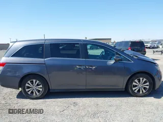 2016 Honda Odyssey EX z VIN 5FNRL5H43GB052589, wystawiony jako IAAI lot #42404965 z przebiegiem 107 292 mil mil oraz . Historia ofert i sprzedaży dostępna na DreamBid. Obrazek 13.