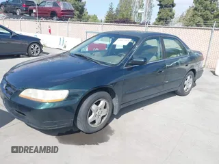 1998 Honda Accord EX z VIN 1HGCG1654WA030513, wystawiony jako IAAI lot #42057213 z przebiegiem 261 897 mil mil oraz . Historia ofert i sprzedaży dostępna na DreamBid. Obrazek 2.
