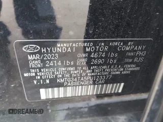 2023 Genesis G70 2.0T z VIN KMTG34TA5PU123377, wystawiony jako IAAI lot #41632566 z przebiegiem 12 184 mil mil oraz . Historia ofert i sprzedaży dostępna na DreamBid. Obrazek 9.