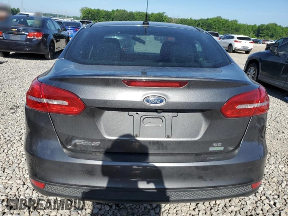 2016 Ford Focus SE with VIN 1FADP3FE8GL381855, listed as a Copart auction lot 57366645 with 104,709 mi miles and Salvage title. Bid and sale history available at DreamBid. Image 6.
