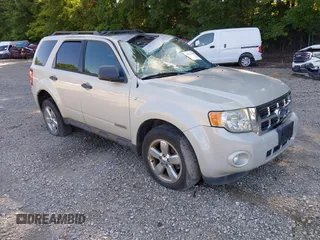 2008 Ford Escape XLT with VIN 1FMCU93198KE17879, listed as a IAAI auction lot 40125825 with 214,373 mi miles and . Bid and sale history available at DreamBid. Image 1.
