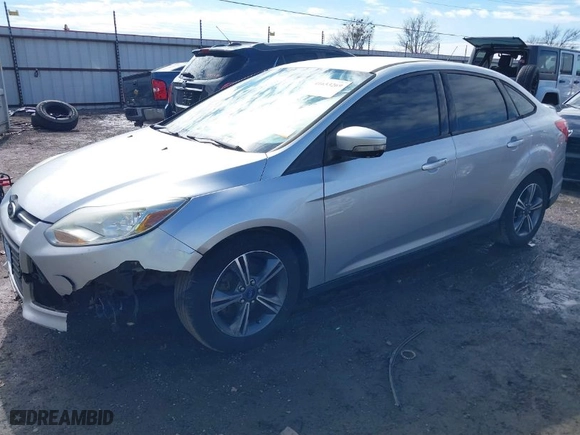 2014 Ford Focus SE with VIN 1FADP3F21EL110316, listed as a IAAI auction lot 41653269 with 187,220 mi miles. Bid and sale history available at carsss.com. Image 2.