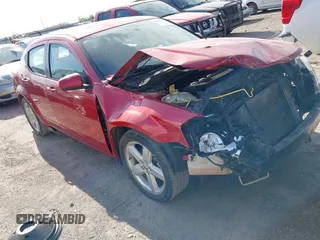 2013 Dodge Avenger SXT with VIN 1C3CDZCB1DN682290, listed as a IAAI auction lot 41964841 with 156,511 mi miles and . Bid and sale history available at carsss.com. Image 1.