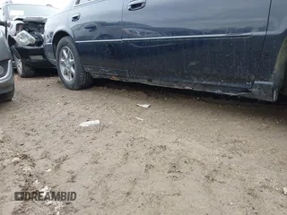 1999 Cadillac Seville Touring STS z VIN 1G6KY5493XU913994, wystawiony jako IAAI lot #41780695 z przebiegiem 60 375 mil mil oraz . Historia ofert i sprzedaży dostępna na DreamBid. Obrazek 13.