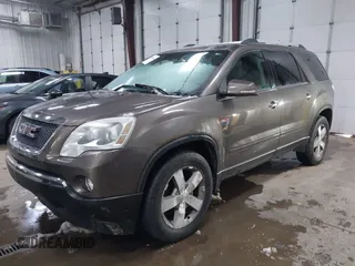 2011 GMC Acadia SLT1 with VIN 1GKKRREDXBJ331099, listed as a IAAI auction lot 41950066 with 128,067 mi miles. Bid and sale history available at carsss.com. Image 2.