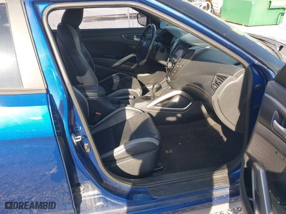 2016 Hyundai Veloster Turbo with VIN KMHTC6AE4GU260112, listed as a IAAI auction lot 41868273 with 130,853 mi miles. Bid and sale history available at carsss.com. Image 5.