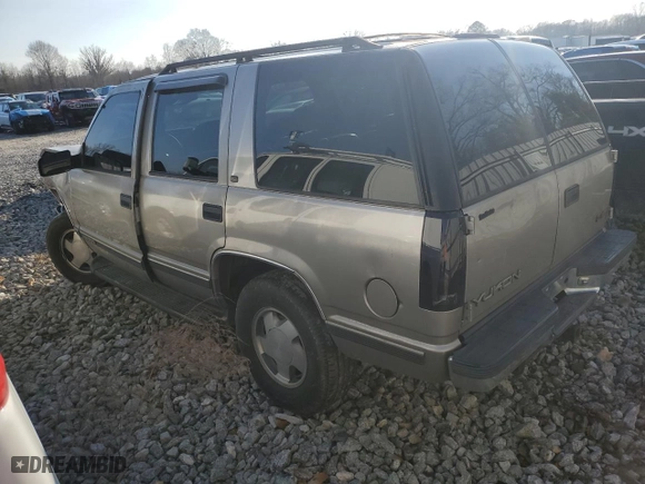 1999 GMC Yukon with VIN 1GKEK13R3XJ785249, listed as a Copart auction lot 42825185 with NaN miles and Salvage Title. Bid and sale history available at carsss.com. Image 2.