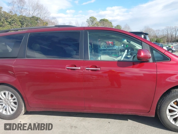 2014 Toyota Sienna XLE with VIN 5TDYK3DCXES442968, listed as a IAAI auction lot 41241310 with 132,020 mi miles and . Bid and sale history available at DreamBid. Image 13.