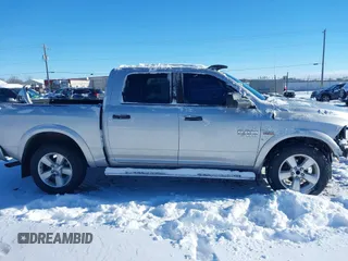 2015 Ram 1500 Big Horn z VIN 1C6RR7LT2FS620252, wystawiony jako IAAI lot #41149484 z przebiegiem 137 784 mil mil oraz . Historia ofert i sprzedaży dostępna na DreamBid. Obrazek 14.