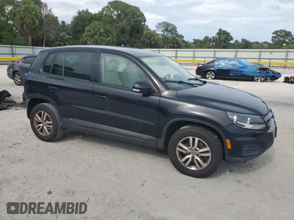 2012 Volkswagen Tiguan SE with VIN WVGAV7AX1CW557300, listed as a Copart auction lot 58975585 with 183,344 mi miles and Salvage title. Bid and sale history available at DreamBid. Image 4.