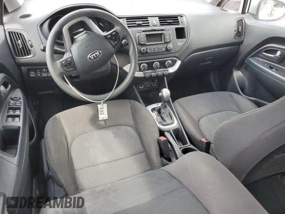2014 Kia Rio LX with VIN KNADM4A38E6384696, listed as a Copart auction lot 58718174 with 121,760 mi miles and Salvage Title. Bid and sale history available at DreamBid. Image 8.