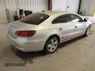 2015 Volkswagen CC Sport with VIN WVWBN7AN1FE816059, listed as a IAAI auction lot 41857589 with 172,854 mi miles and . Bid and sale history available at DreamBid. Image 4.
