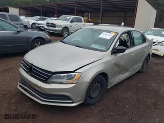 2016 Volkswagen Jetta Sedan 1.4T S with VIN 3VW267AJ6GM290045, listed as a IAAI auction lot 41187685 with 165,284 mi miles. Bid and sale history available at carsss.com. Image 2.