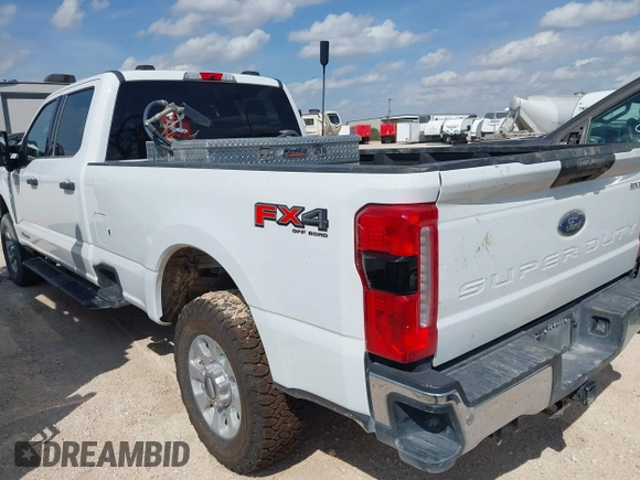 2023 Ford F-250 XL with VIN 1FT7W2BT2PEC64642, listed as a IAAI auction lot 42661561 with 22,936 mi miles and . Bid and sale history available at DreamBid. Image 3.