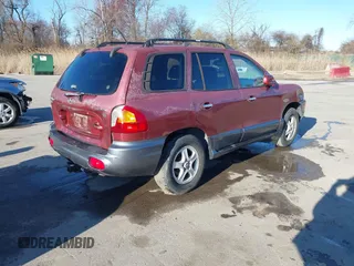 2004 Hyundai Santa Fe GLS with VIN KM8SC13EX4U798868, listed as a IAAI auction lot 41835652 with 222,350 mi miles. Bid and sale history available at carsss.com. Image 4.