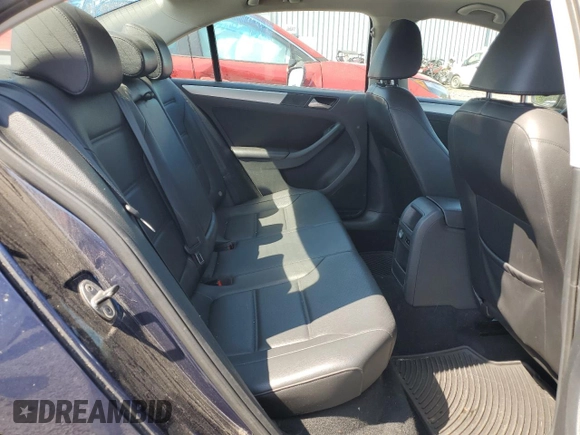 2014 Volkswagen Jetta SE with VIN 3VWD17AJ9EM323625, listed as a Copart auction lot 58211655 with 108,099 mi miles and Salvage title. Bid and sale history available at DreamBid. Image 10.