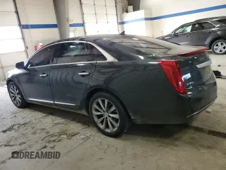 2014 Cadillac XTS with VIN 2G61L5S30E9159696, listed as a Copart auction lot 87954675 with 31,920 mi miles and Salvage Title. Bid and sale history available at carsss.com. Image 2.
